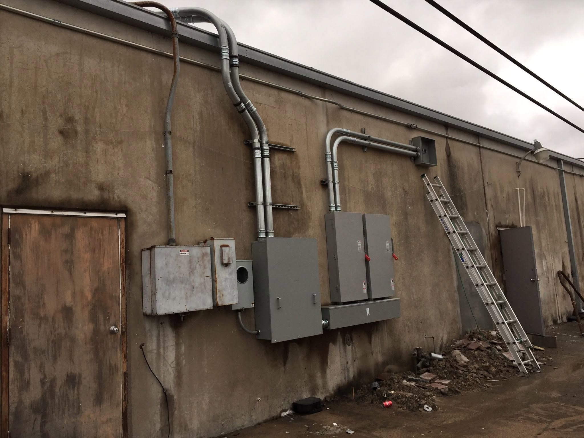 Exterior service upgrade with new disconnect panels
